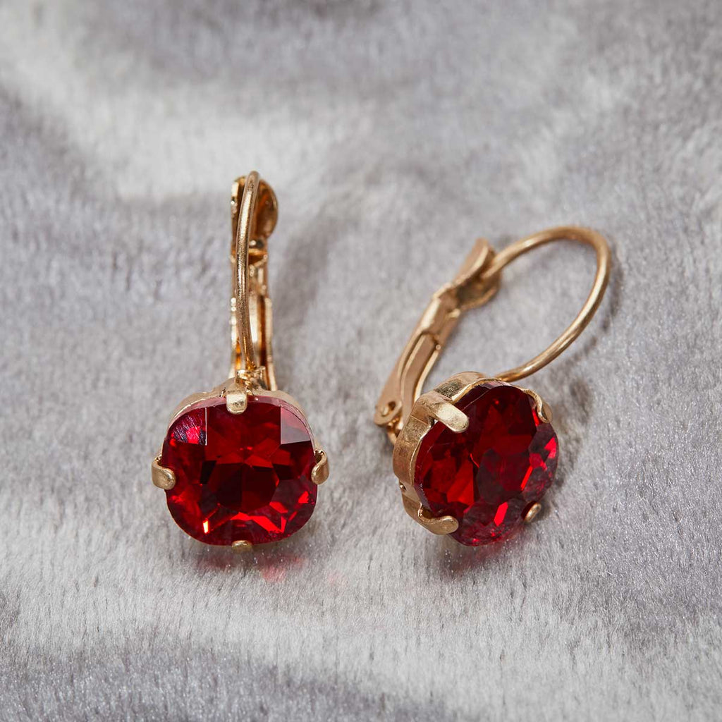 Cushion Cut earring in ruby vintage inspired jewellery by lovett and co pictured on a grey background