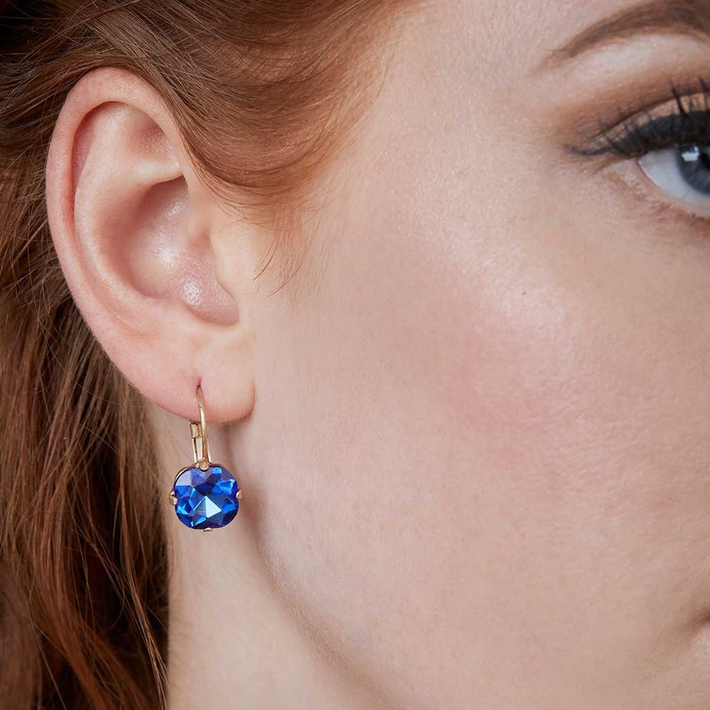 Cushion cut earring in Sapphire by Lovett and Co Vintage Inspired Jewellery 1950s earring pictured on a model