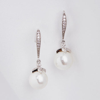 Image of 1950's inspired vintage style crystal drop earrings with cream pearls, perfect for wedding and any other special occasion