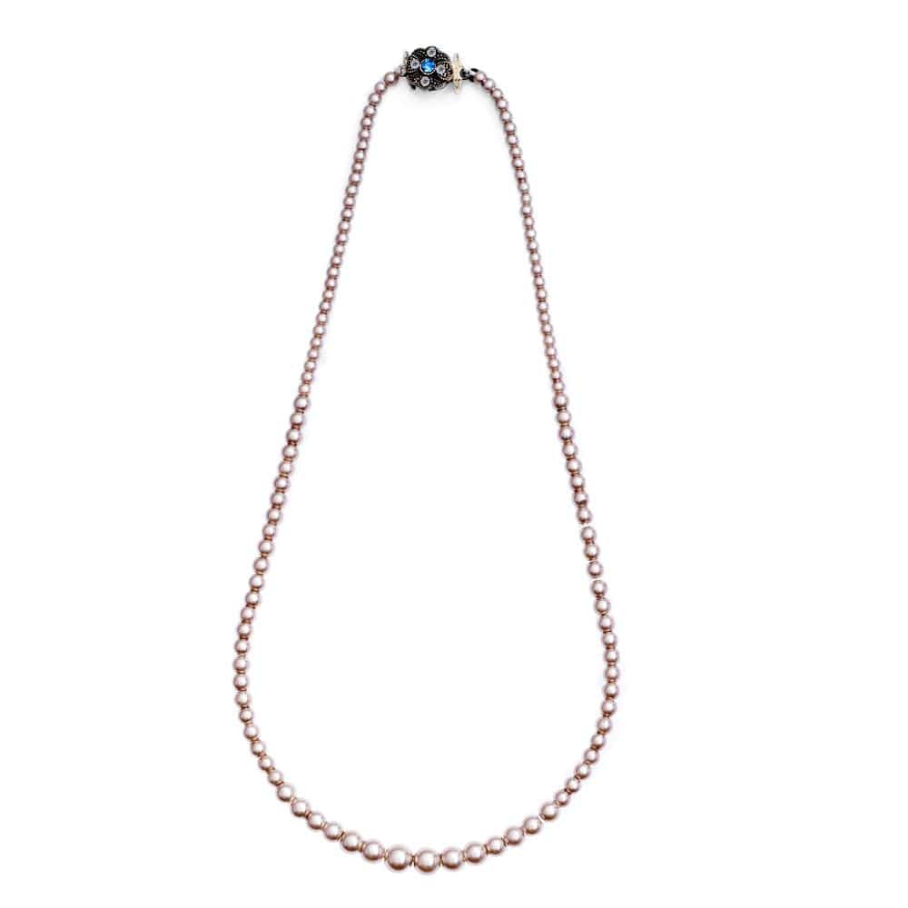 vintage inspired dusky pink pearl necklace by lovett and co, pictured on a white background. costume jewellery